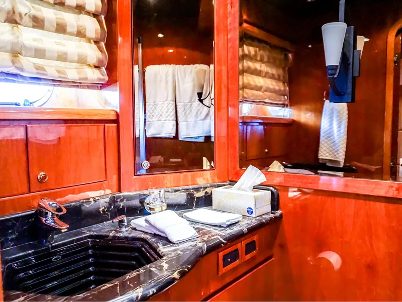 Slide: The Image of Luxurious bathroom interior of 2003 Hargrave Sky Lounge Motoryacht with marble countertop. - 25