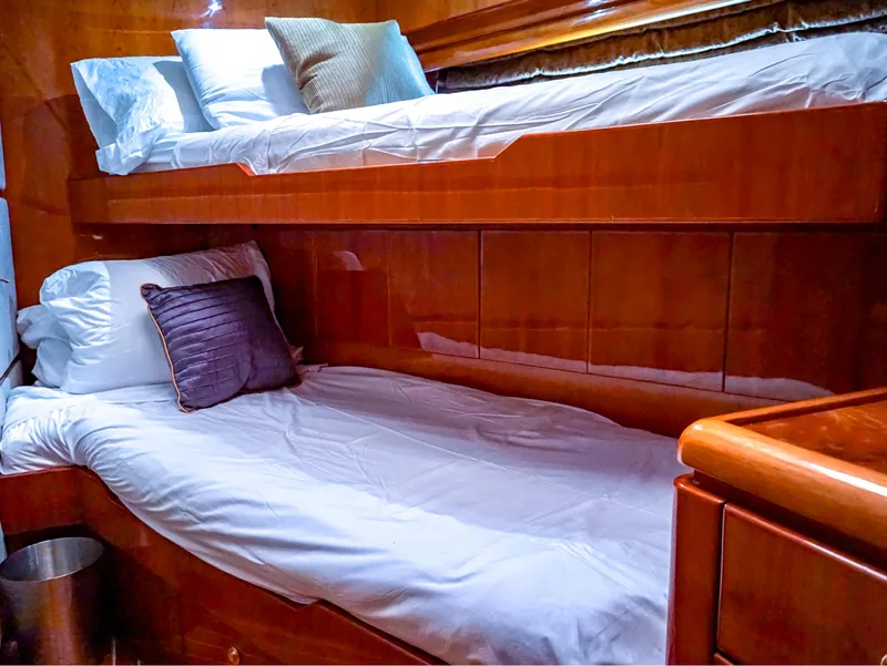 Slide: The Image of Bunk beds in 2003 Hargrave Sky Lounge Motoryacht cabin with wooden interior. - 26