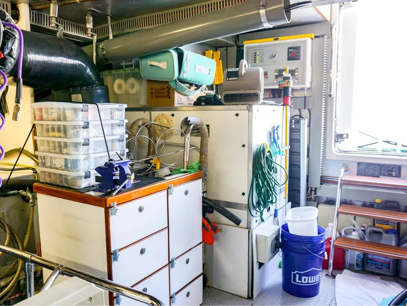 Slide: The Image of Engine room of 2003 Hargrave Sky Lounge Motoryacht with tools and equipment. - 31