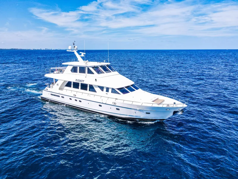 Slide: The Image of 2003 Hargrave Sky Lounge Motoryacht cruising on open blue sea. - 33