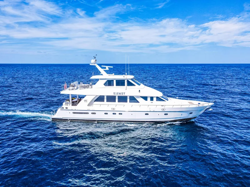 Slide: The Image of 2003 Hargrave Sky Lounge Motoryacht cruising on open blue sea. - 35