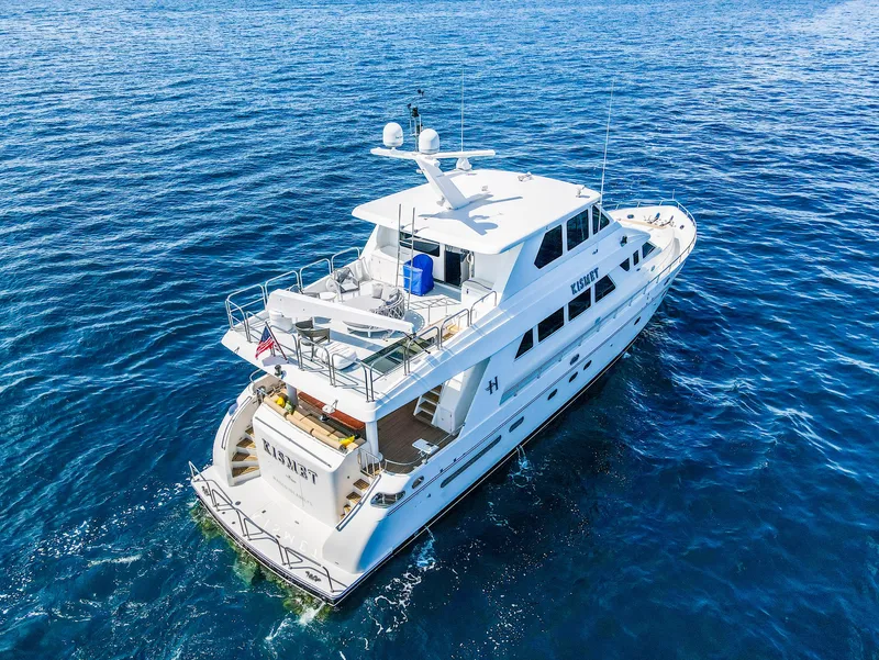 Slide: The Image of 2003 Hargrave Sky Lounge Motoryacht cruising on open blue sea. - 37