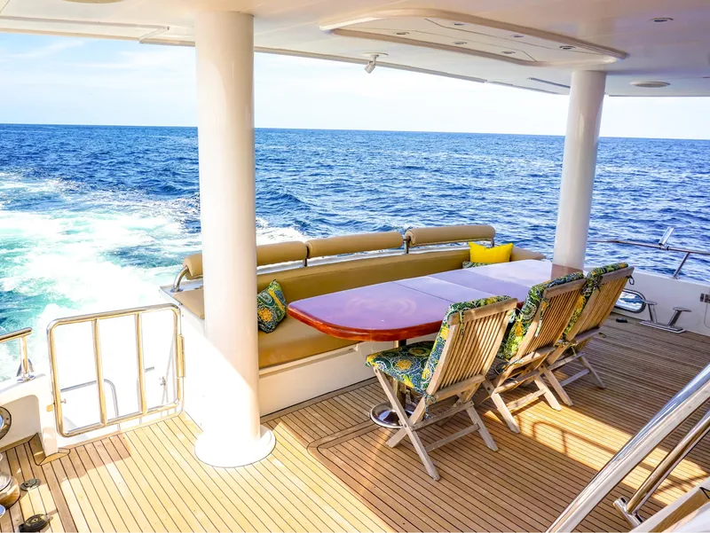 Slide: The Image of Hargrave Sky Lounge Motoryacht 2003, elegant deck seating with ocean view. - 5