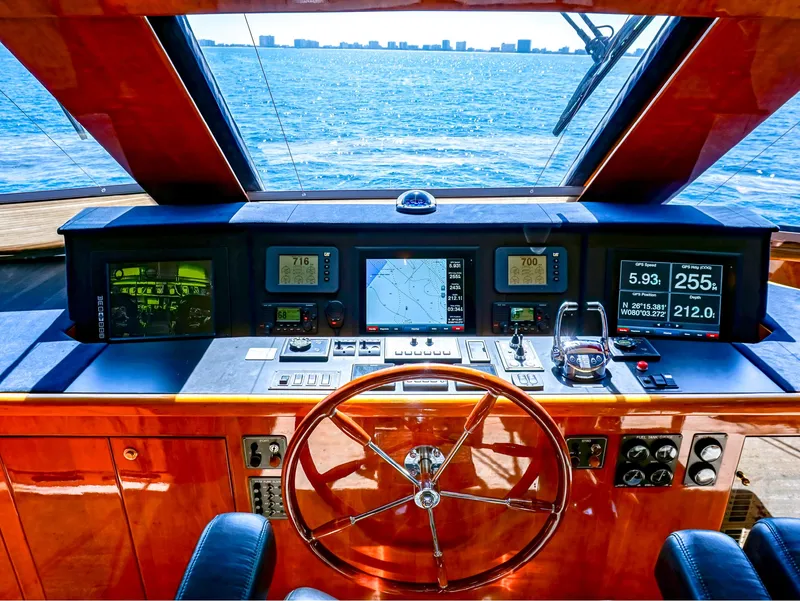 Slide: The Image of Helm of 2003 Hargrave Sky Lounge Motoryacht with ocean view and navigation instruments. - 7