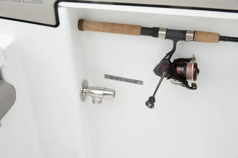 Slide: The Image of Fishing rod holder on 2024 Wellcraft 202 Fisherman boat. - 26