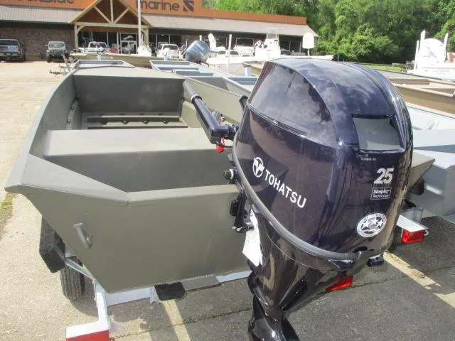 Slide: The Image of 2025 GC 1444 Jon boat with Tohatsu 25HP outboard motor on trailer. - 4