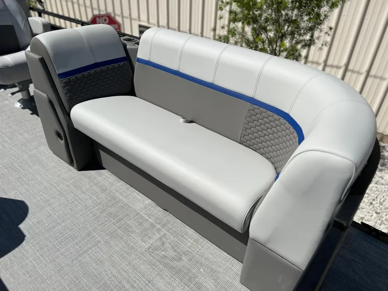 Slide: The Image of 2024 Qwest RLS 818 boat seating with gray and blue upholstery. - 2