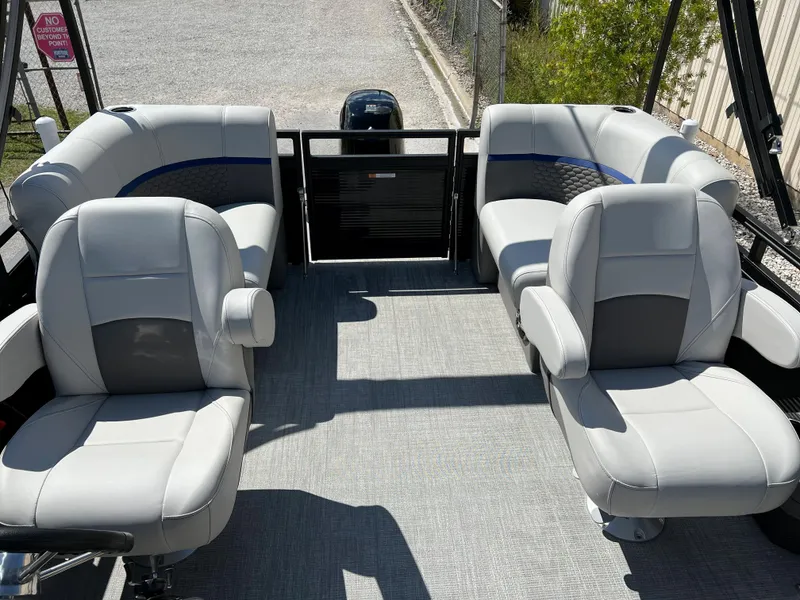 Slide: The Image of 2024 Qwest RLS 818 boat interior with gray seating and spacious layout. - 5