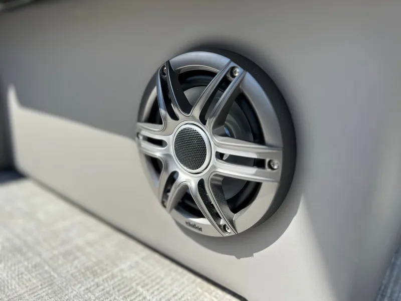 Slide: The Image of Close-up of a speaker on a 2024 Qwest RLS 818 boat. - 8