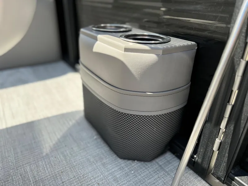 Slide: The Image of Qwest RLS 818 2024 boat cup holder and storage compartment. - 9