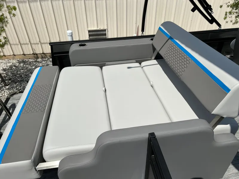 Slide: The Image of 2024 Qwest Splash Pad 822 boat seating with gray and blue upholstery. - 8