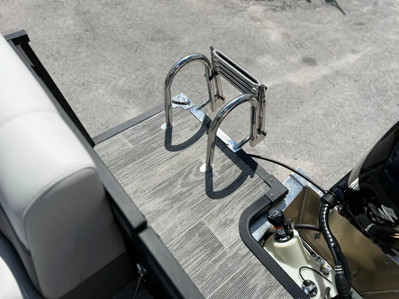 Slide: The Image of 2024 Qwest RLS 820 boat with rear deck and stainless steel ladder. - 15