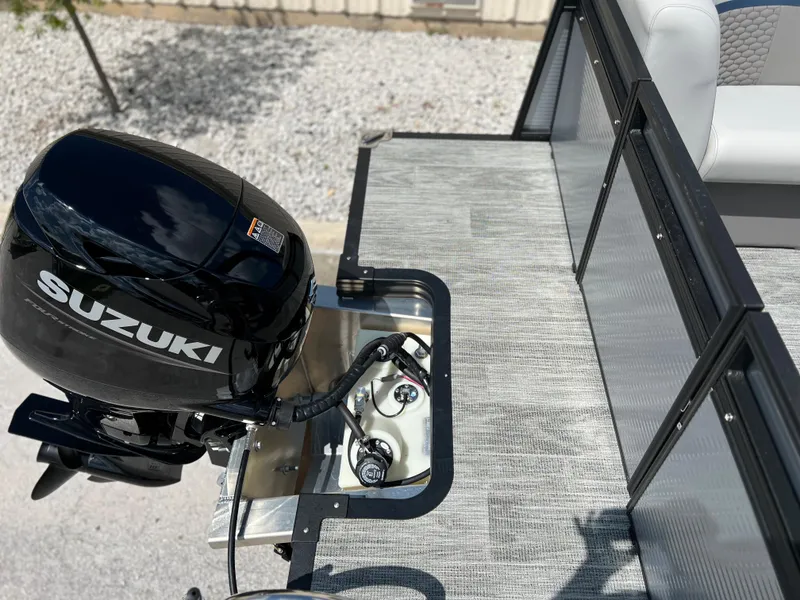 Slide: The Image of 2024 Qwest RLS 820 boat with Suzuki outboard motor. - 17