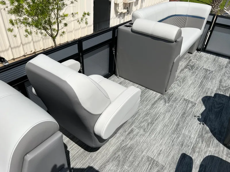 Slide: The Image of 2024 Qwest RLS 820 boat interior with gray and white seating. - 8