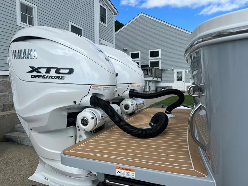 Slide: The Image of 2024 Regulator 31 boat with twin Yamaha XTO Offshore engines. - 18