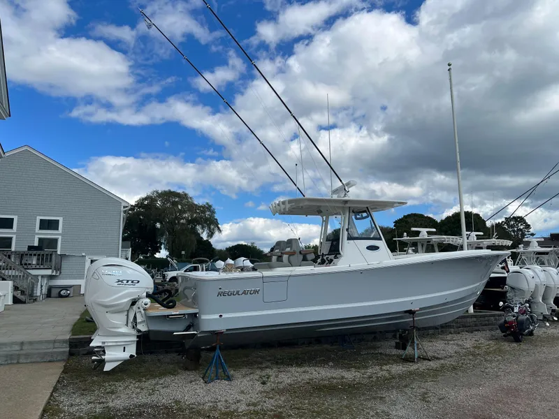 Slide: The Image of 2024 Regulator 31 boat on stands, ready for launch. - 3