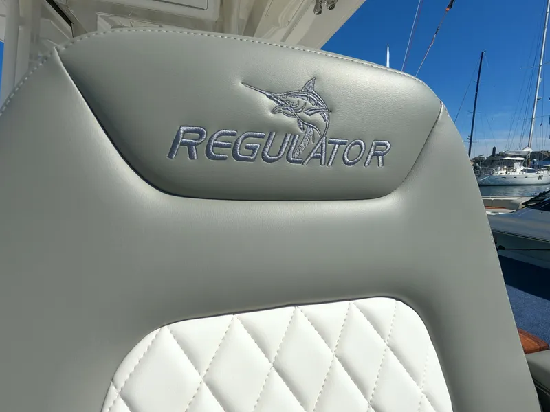 Slide: The Image of 2024 Regulator 31 boat seat with logo embroidery. - 44