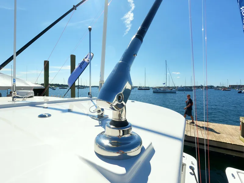 Slide: The Image of 2024 Regulator 31 boat docked at marina with clear blue sky. - 47