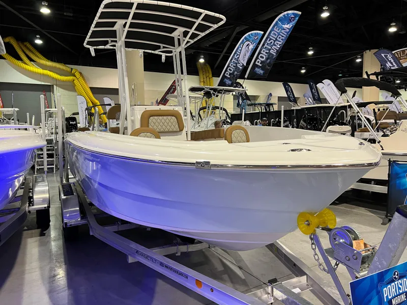 Slide: The Image of 2024 Clearwater 2000 boat on display at an indoor boat show. - 20