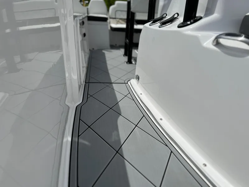 Slide: The Image of 2024 Clearwater 1900 boat interior with modern, non-slip flooring. - 25