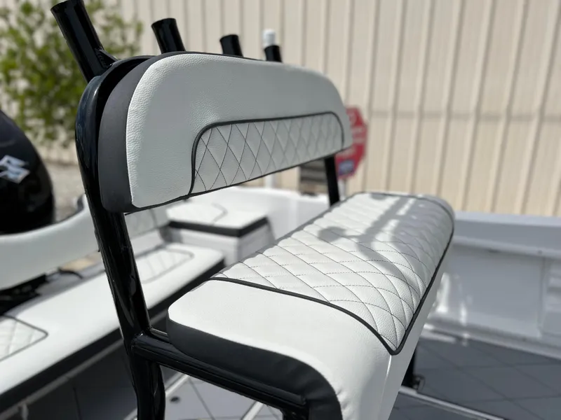 Slide: The Image of Clearwater 1900 2024 boat with white and black diamond-stitched seating. - 8