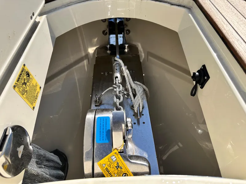 Slide: The Image of Anchor compartment of a 2021 Chris-Craft Calypso 35 boat. - 25