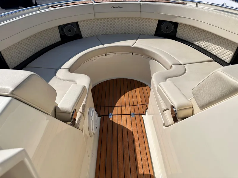 Slide: The Image of 2021 Chris-Craft Calypso 35 boat with luxurious seating and teak flooring. - 36