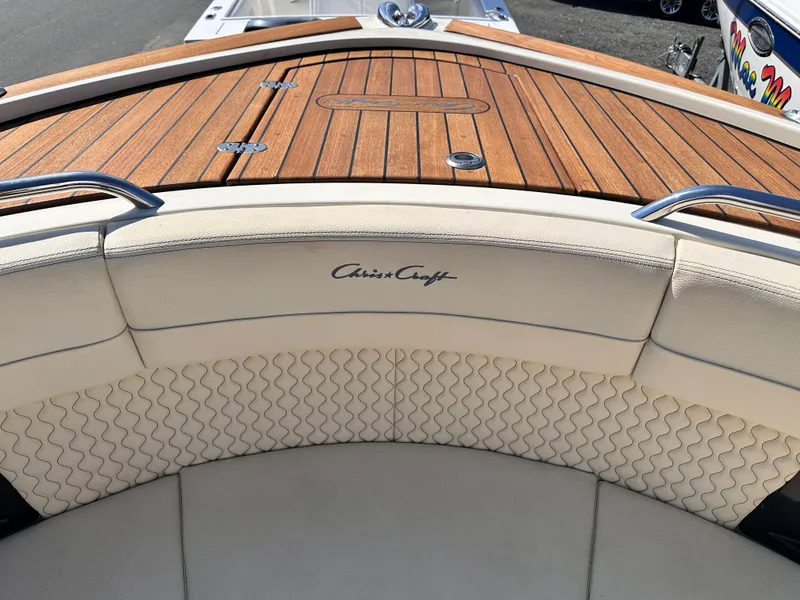 Slide: The Image of 2021 Chris-Craft Calypso 35 boat with teak deck and luxurious seating. - 37
