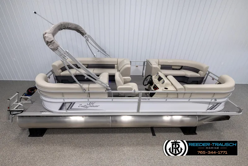 Slide: The Image of 2024 SunChaser Vista 22 LR pontoon boat with beige seating and canopy. - 1