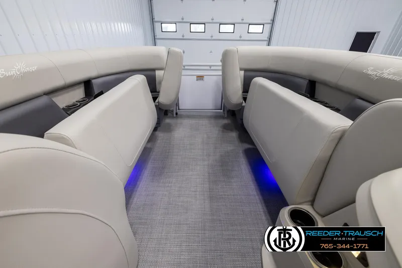 Slide: The Image of 2024 SunChaser Vista 22 LR interior with beige seating and blue LED lighting. - 19