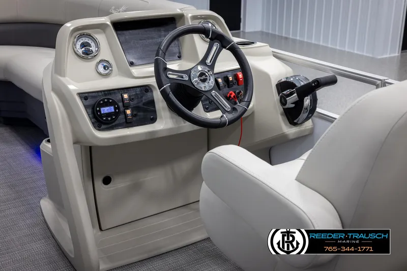 Slide: The Image of 2024 SunChaser Vista 22 LR boat dashboard and steering wheel. - 25