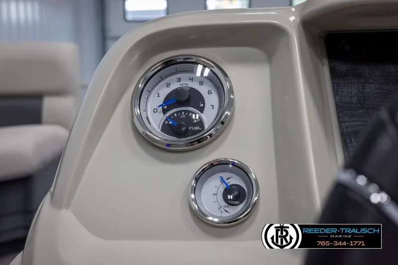 Slide: The Image of 2024 SunChaser Vista 22 LR dashboard with fuel and trim gauges. - 29