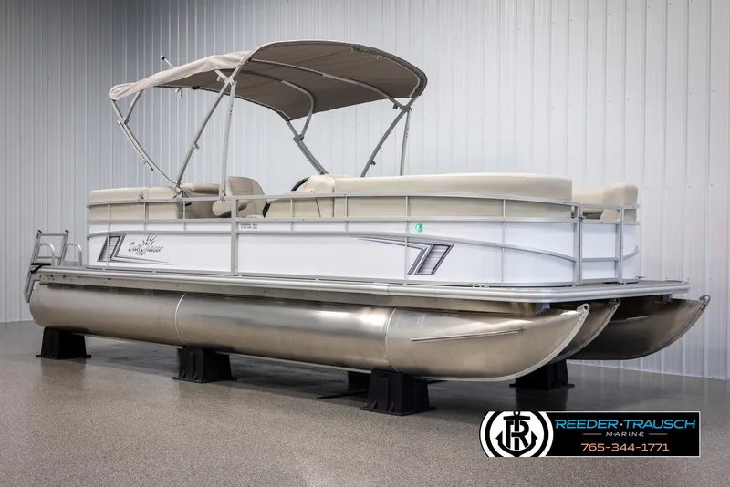 Slide: The Image of 2024 SunChaser Vista 22 LR pontoon boat in showroom. - 3