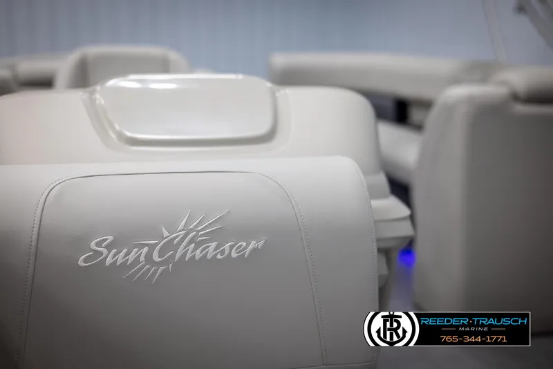 Slide: The Image of 2024 SunChaser Vista 22 LR boat interior with embroidered logo and seating. - 34