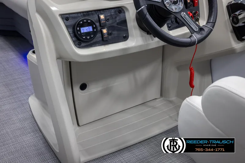 Slide: The Image of 2024 SunChaser Vista 22 LR boat dashboard and steering wheel. - 37