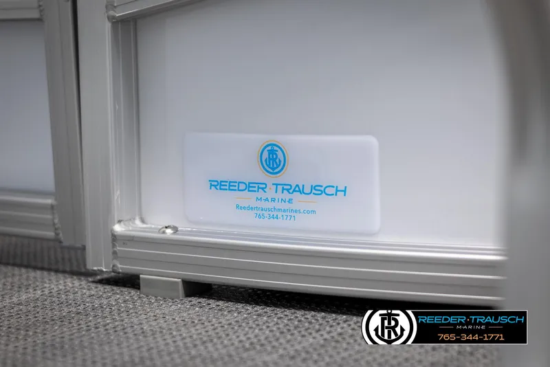 Slide: The Image of 2024 SunChaser Vista 22 LR boat detail with Reeder Trausch Marine logo and contact information. - 44