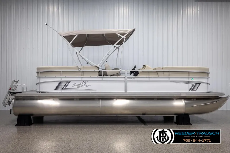 Slide: The Image of 2024 SunChaser Vista 22 LR pontoon boat with canopy in showroom. - 5