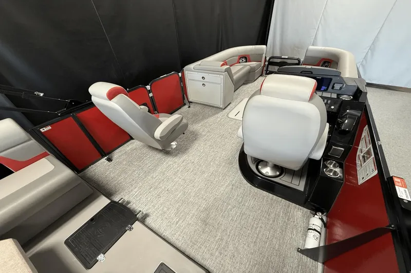 Slide: The Image of 2024 Premier 250 Solaris boat interior with modern seating and control console. - 23