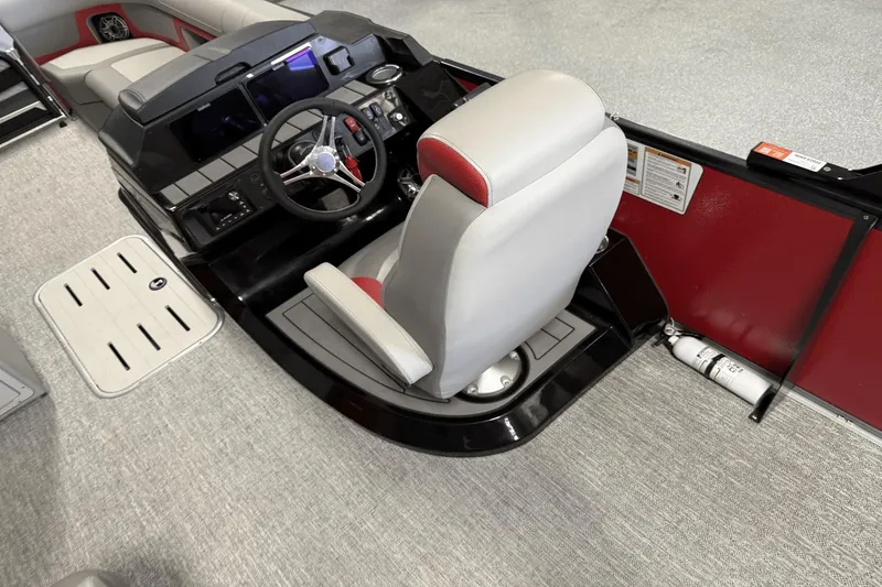 Slide: The Image of 2024 Premier 250 Solaris boat helm with modern controls and comfortable seating. - 27