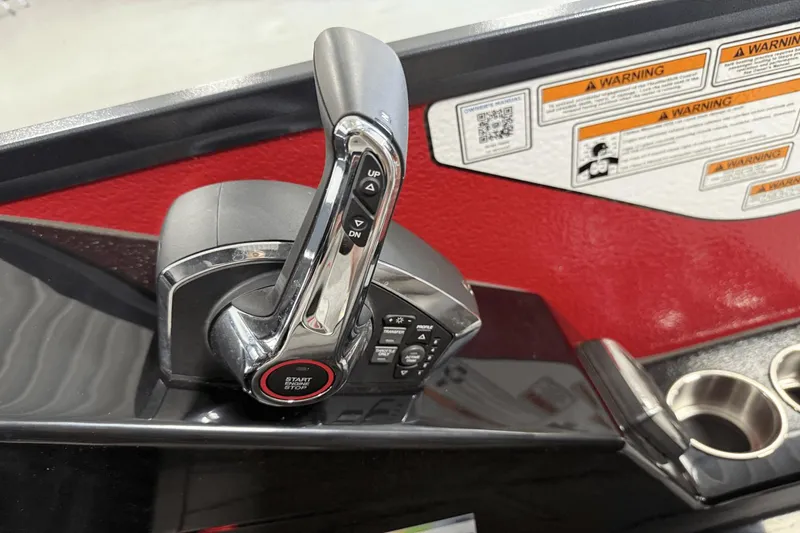 Slide: The Image of Throttle control panel of 2024 Premier 250 Solaris boat with warning labels. - 39