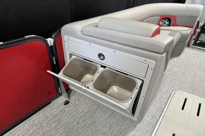 Slide: The Image of 2024 Premier 250 Solaris boat interior with built-in storage and seating. - 44