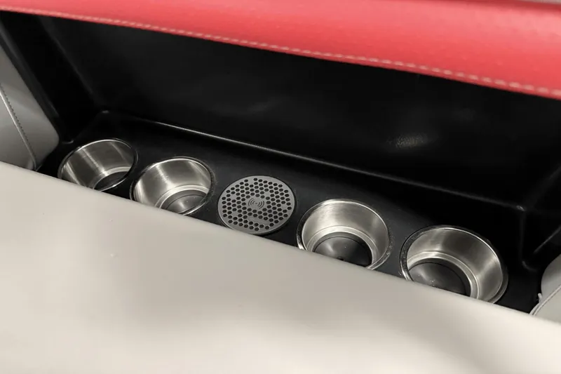 Slide: The Image of Cup holders and speaker in 2024 Premier 250 Solaris boat interior. - 47