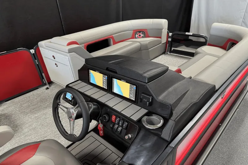 Slide: The Image of 2024 Premier 250 Solaris boat interior with modern dashboard and spacious seating. - 6