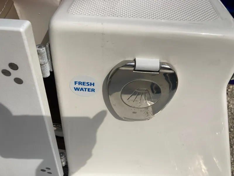 Slide: The Image of Fresh water access on 2024 Sea Born SX239 Offshore boat. - 12