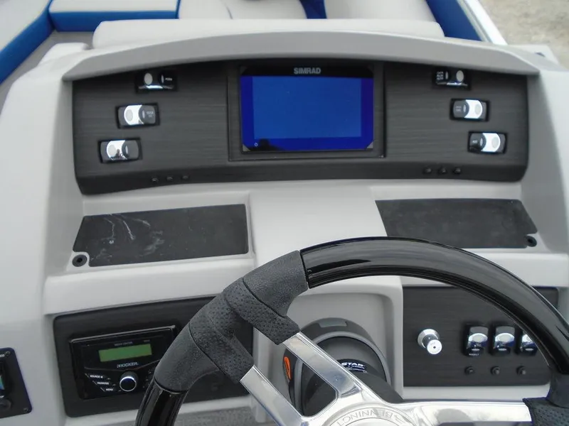 Slide: The Image of Dashboard of 2024 Bennington 23 LTFB boat with steering wheel and control panel. - 15