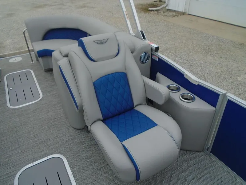Slide: The Image of 2024 Bennington 23 LTFB boat interior with luxurious seating and cup holders. - 21