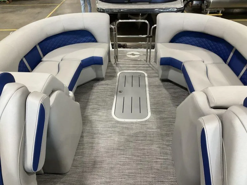 Slide: The Image of 2024 Bennington 23 LTFB pontoon boat interior with gray and blue seating. - 3
