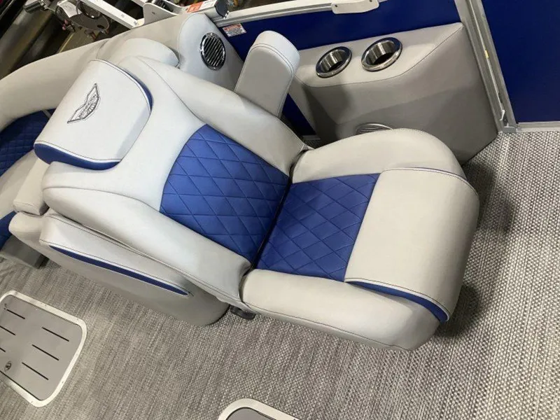 Slide: The Image of 2024 Bennington 23 LTFB boat interior with luxurious blue and gray seating. - 7