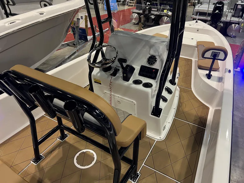 Slide: The Image of 2024 Clearwater 2100 Baystar boat interior with console and seating. - 15