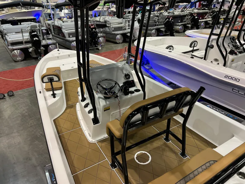 Slide: The Image of 2024 Clearwater 2100 Baystar boat interior at a boat show. - 6